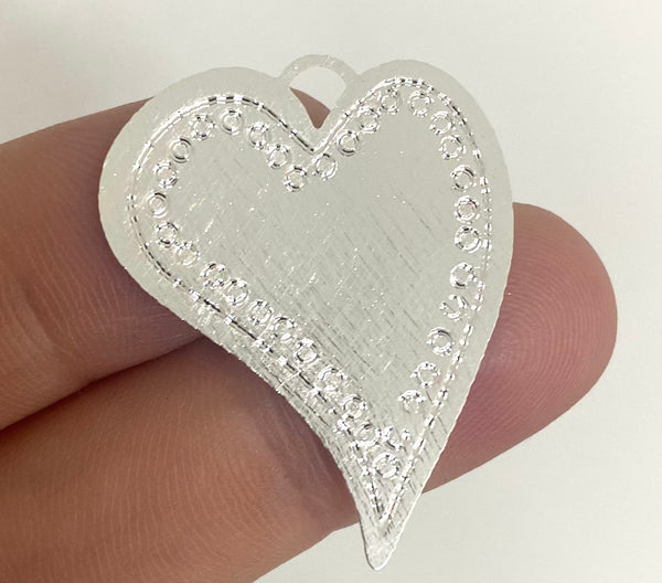 Corazón relleno perfil borde puntos 3,2cm Plata