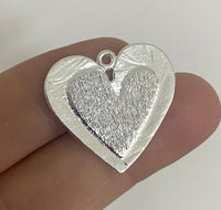 Corazon sobre corazon 2,5cm Plata