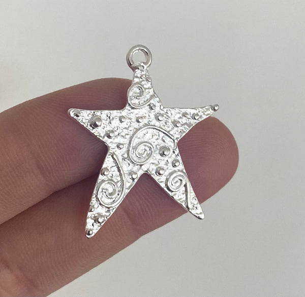 Estrella psicodélica 3cm Plata